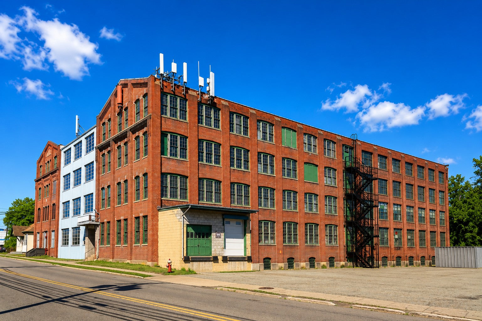 The historic Packard factory building that houses Kanter Auto at 662 Myrtle Ave